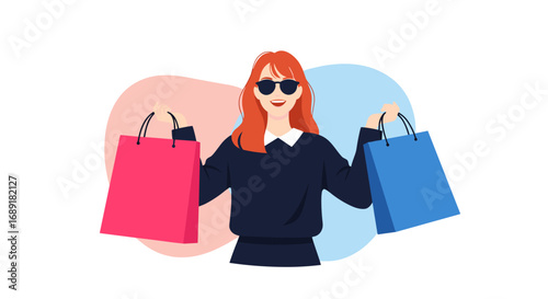A cheerful woman with red hair wearing sunglasses holds up shopping bags on a white background