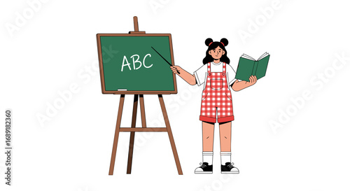 A young teacher enthusiastically explains the alphabet abc on a blackboard holding an open book