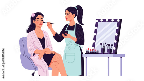 Professional makeup artist applying cosmetics to a client in a salon setting with a lighted mirror