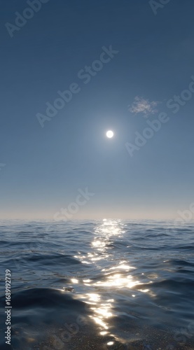 Sun glints on calm ocean waves under a clear blue sky with a single wisp of cloud. Serene, minimalist seascape
