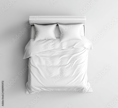 Top-down view of a bed with white linens and two pillows, bathed in bright, neutral light, creating a simple, minimalist aesthetic