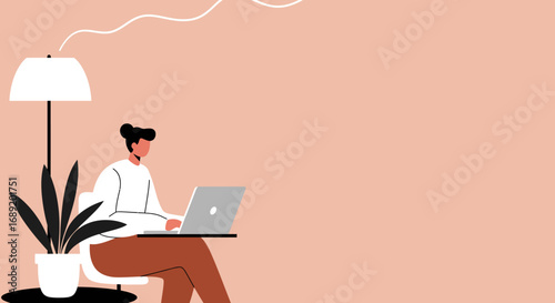 Young professional working efficiently on a laptop in a comfortable, minimalist workspace. Represents remote work, freelancing, and digital lifestyle.