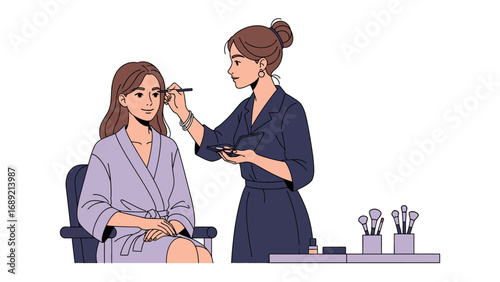 Professional makeup artist applying cosmetics to a client preparing for a special event or photoshoot