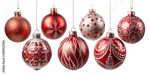 Collection of seven decorative red and pink christmas ornaments hanging isolated on white background