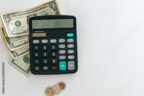 Calculator with Dollar Banknotes