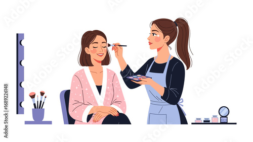 Professional makeup artist skillfully applying cosmetics to a client s face in a well lit studio setting