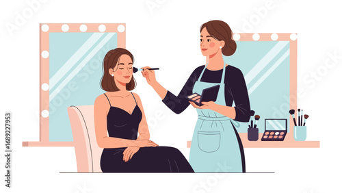 Professional makeup artist applying cosmetics to a client in a glamorous dressing room setting