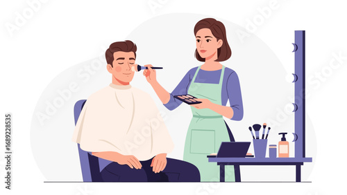 Professional makeup artist applying cosmetics to a male client in a studio setting