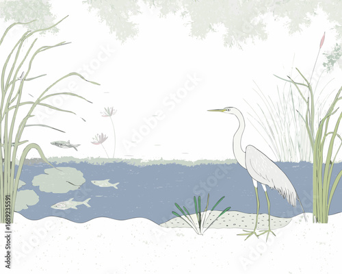 A great egret stands by a tranquil pond with fish and water lilies