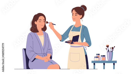 Professional makeup artist applying cosmetics to a client s face with a brush and palette