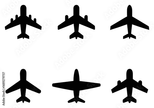 Collection of black airplane silhouettes on white background.  Airplane vector set