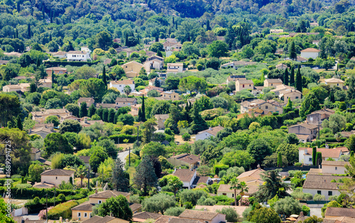 Residential area in Grasse with houses, Mediterranean gardens and terracotta roofs in southern French hilly landscape - Provence real estate in green nature - Gasse, France 2025-07-02