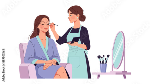 Professional makeup artist applying foundation to a client sitting in a chair with a mirror nearby