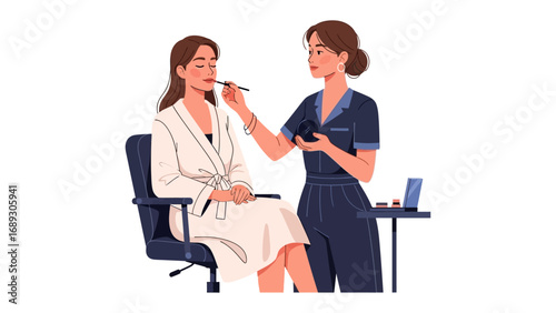 Professional makeup artist applying cosmetics to a client seated in a chair with a vanity table nearby