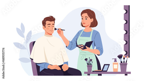 Professional makeup artist applying cosmetics to a male client in a studio setting