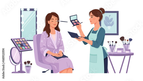 Professional makeup artist applies eyeshadow to a smiling client in a well lit beauty studio setting