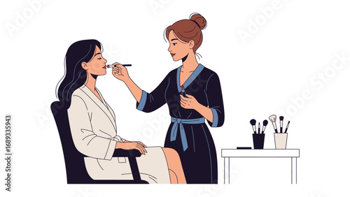 Professional makeup artist applying cosmetics to a client sitting in a chair wearing a robe