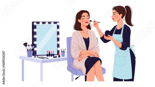 Professional makeup artist applying cosmetics to a client in a well lit vanity area