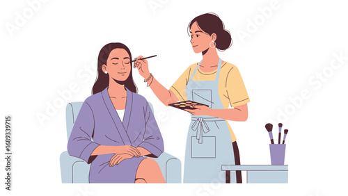 Professional makeup artist applying eyeshadow to a seated client in a salon setting with tools visible