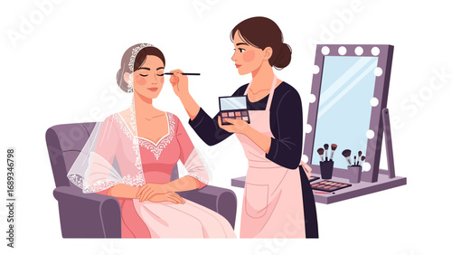 Professional makeup artist applying cosmetics to a client in a beauty salon with a lighted vanity mirror
