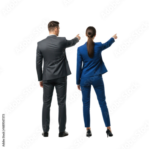 Two business professionals standing and pointing towards a digital screen.