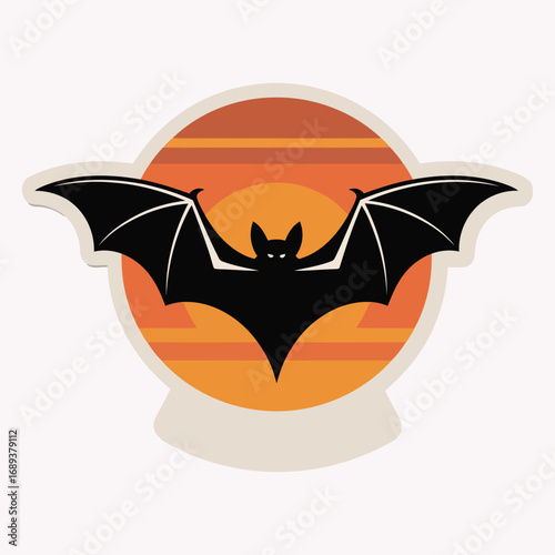 Silhouette of a bat flying in front of a large orange moon