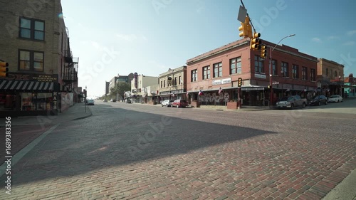 Old Red Brick Street Road Surrounded By Historic Buildings in Fort Worth, Texas