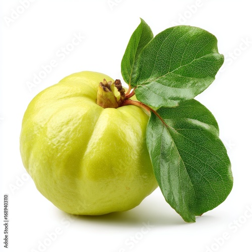 A close-up shot of a quince fruit, showcasing its natural beauty with leaves, highlighting fresh produce
