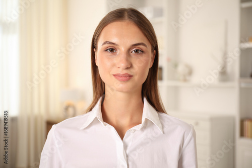 Portrait of beautiful young woman at home Free Download Portrait of beautiful young woman at home - GFXLoad