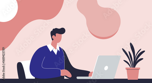 A professional man works diligently on his laptop at a desk in a modern office setting. Represents productivity, remote work, and digital business solutions.