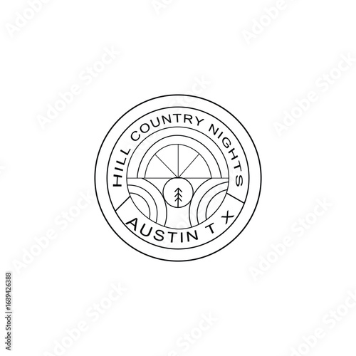 Circular emblem or logo with crosshairs and text reading hill country shooting Austin tx