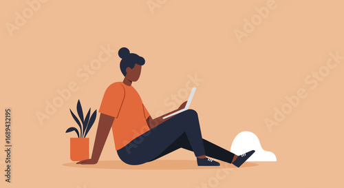 Young person working remotely on a laptop, embodying modern freelance lifestyle, online education, or casual digital productivity from home.