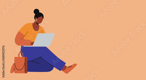 A focused woman sits casually, working on her laptop. Ideal for concepts of remote work, online learning, productivity, and modern digital lifestyle.