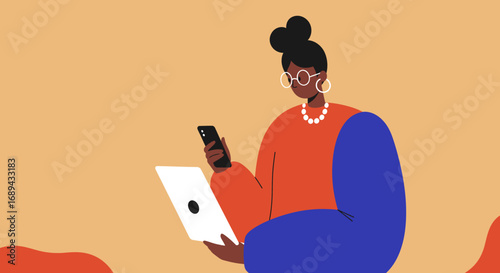 Stylish woman using a laptop and smartphone simultaneously, representing digital connectivity, online communication, and modern remote work or learning.