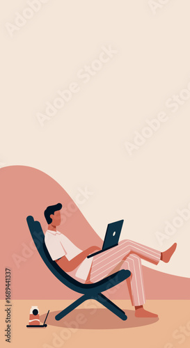 Young man comfortably works remotely on his laptop from a lounge chair, enjoying a flexible modern lifestyle. Perfect for concepts of home office, freelance, and digital nomad.