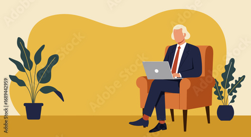 Professional senior man working remotely on a laptop from a comfortable armchair, embodying productivity and modern business lifestyle.
