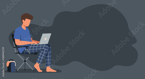 Comfortable young man working remotely on laptop from home, embodying modern telecommuting, online learning, freelance, and a relaxed lifestyle.