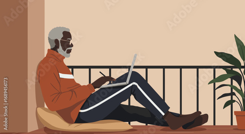 Senior Black man working remotely on a laptop from his balcony, embodying a relaxed and productive lifestyle. Ideal for themes of home office, digital engagement, or leisure.
