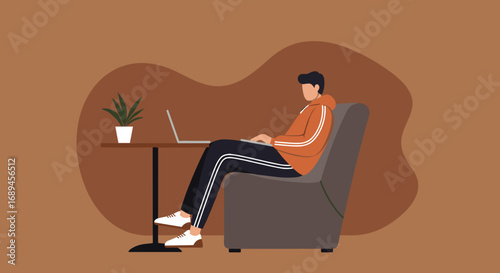 Young man working remotely on a laptop in a comfortable armchair. Ideal for concepts of flexible work, online learning, digital lifestyle, or business innovation.