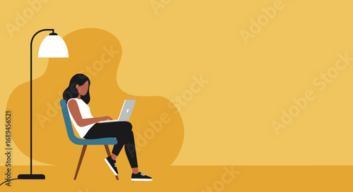 Young woman working remotely on her laptop in a cozy home office setting. Represents productivity, online learning, and modern digital lifestyle.