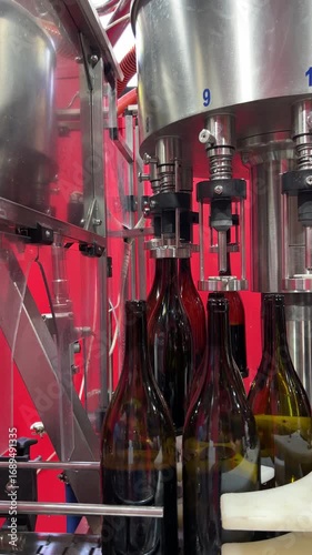 Modern Winery Bottling Line. Close-Up of Wine Bottles on Conveyor
