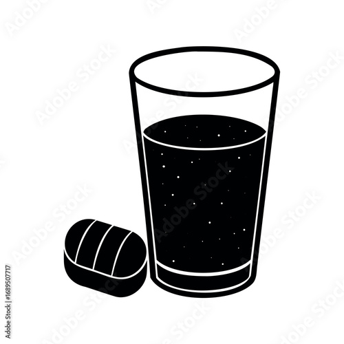 Effervescent tablet with a glass of sparkling water, a refreshing drink