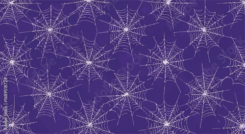 Creepy Halloween spiderweb pattern, a seamless digital background asset with white webs on a vibrant purple field.