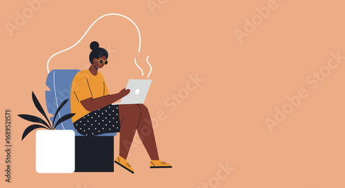 Person works or studies on a laptop in a comfortable setting, symbolizing remote productivity, online learning, or modern digital life.