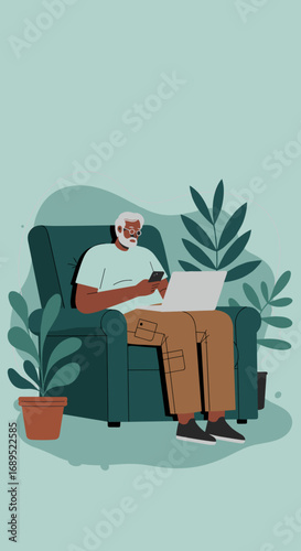 Senior man relaxing comfortably in an armchair, engaged with a smartphone and laptop. Modern digital lifestyle and connectivity for older adults at home.