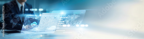 Fotografija Developer using a laptop deploying cloud-based platform as a service, integration tools, scalability, runtime, app hosting, infrastructure, productivity, software solutions, and development support