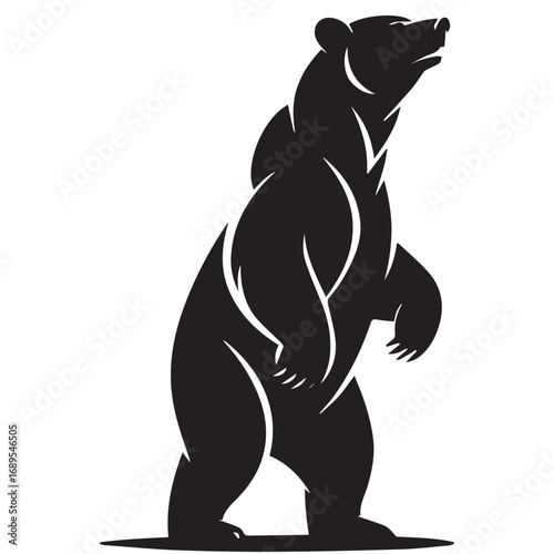Black silhouette of bear standing tall on hind legs upright