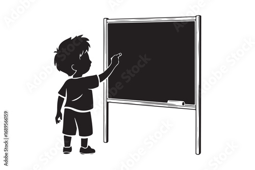 Child drawing on a blackboard with chalk