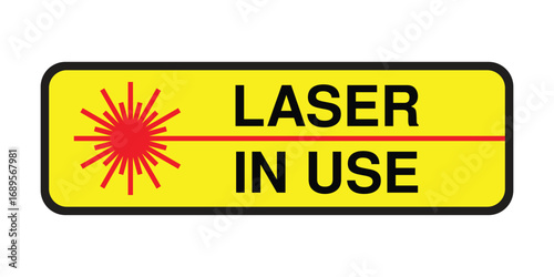 CAUTION Sign – Laser In Use Warning with Yellow Background, Red Radiation Symbol and Bold Black Text, Eye Safety Label for Laboratories, Industrial Zones, and Medical Equipment