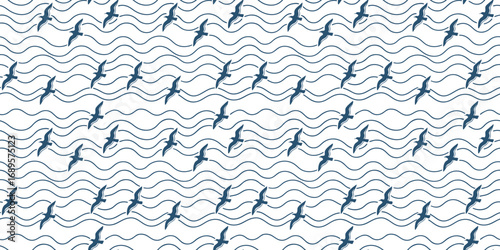 Seamless ocean wave pattern with flying birds in navy blue on white background, perfect for nautical textile, wallpaper, wrapping paper, summer design, and marine projects.